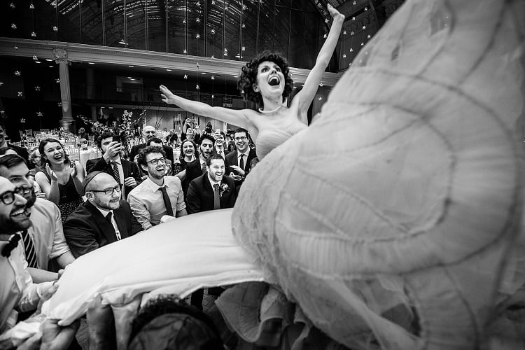 bridebook.co.uk bride flies over guests
