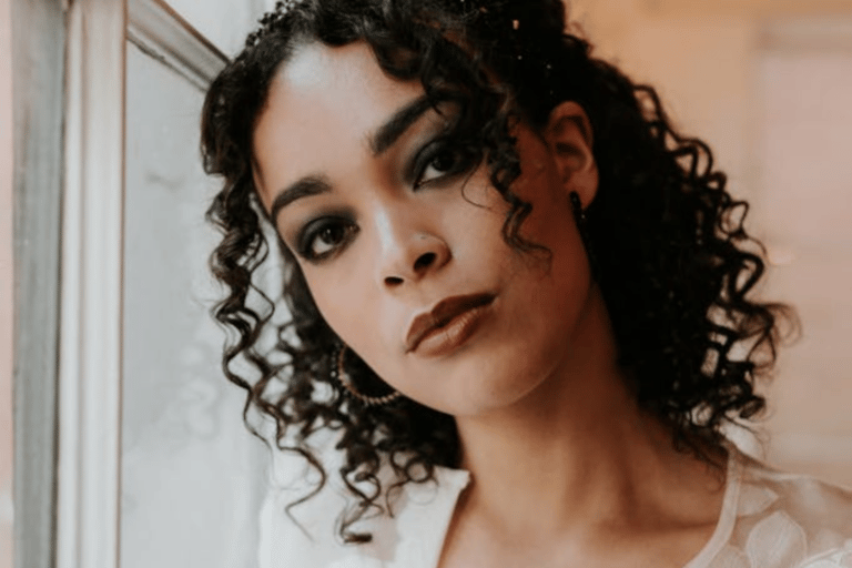 Person with tight curls hairstyle 