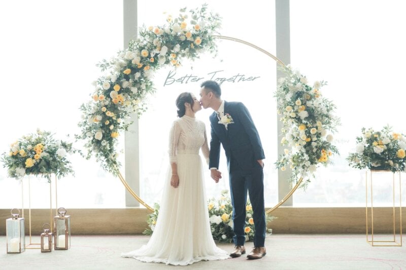 Kissing couple at a wedding