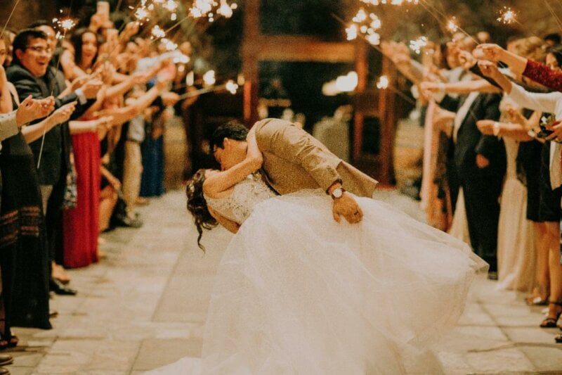 Married couple kissing