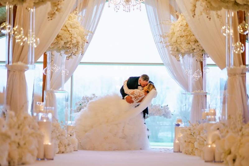 couple at a neutral white wedding