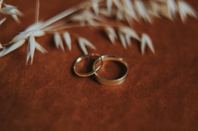 Two wedding bands laid out on a table 