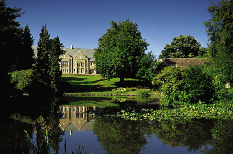 Wedding venue exterior showing outside of the building and a lake