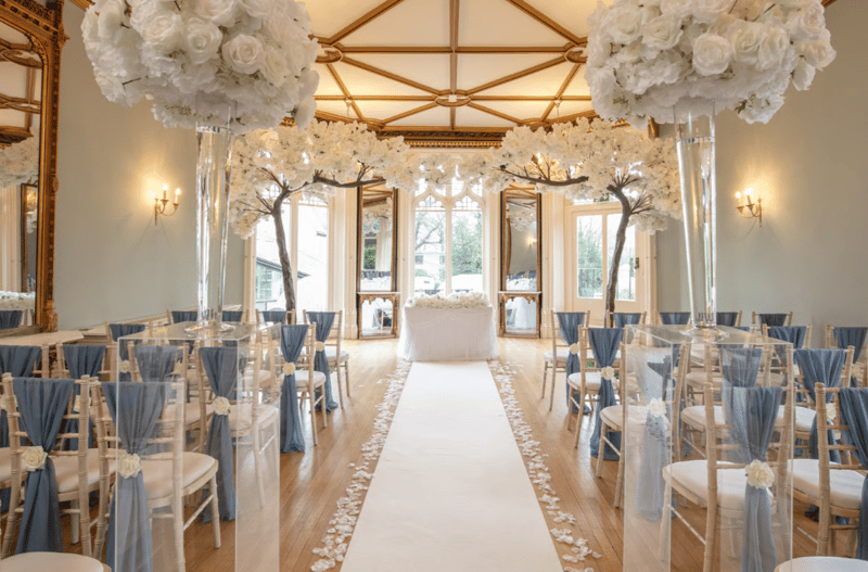 Wedding ceremony room decorated in blue and white