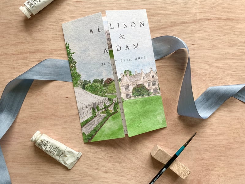 a watercolour wedding invitation depicting the couple's wedding venue