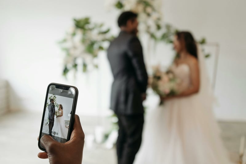 Wedding ceremony being filmed by a wedding content creator