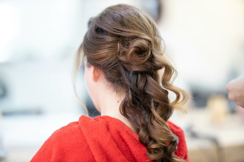 wedding guest hairstyles inspiration showing loose half up waves