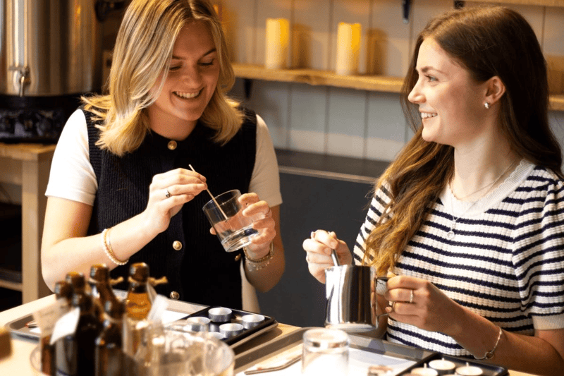 Couple making candles together at a gift experience