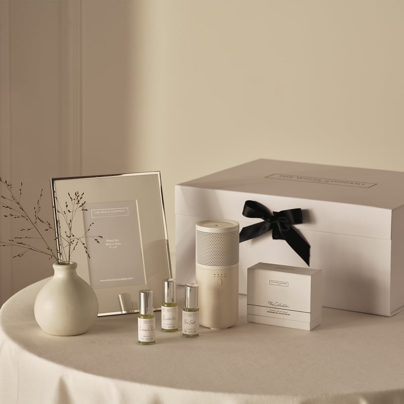 gift set with oil diffuser and a silver photo frame
