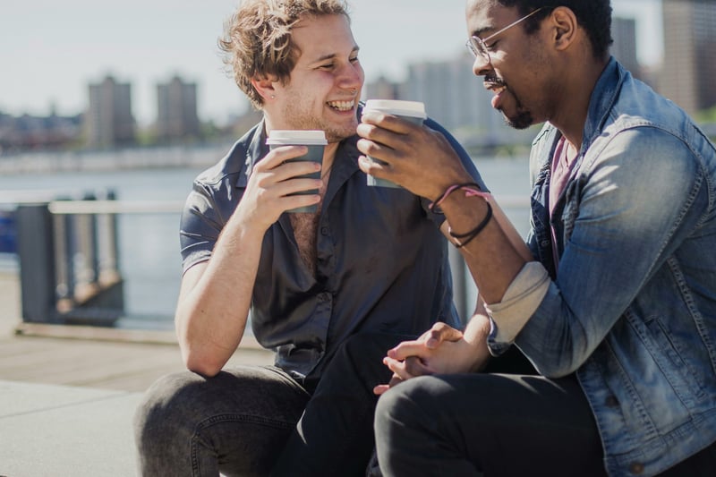 Happy couple drinking coffee together
