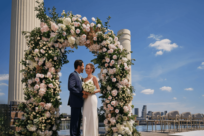 Rooftop infinity pool at Art'otel London Battersea Power Station, with 360-degree views of the London skyline and Battersea Power Station chimneys