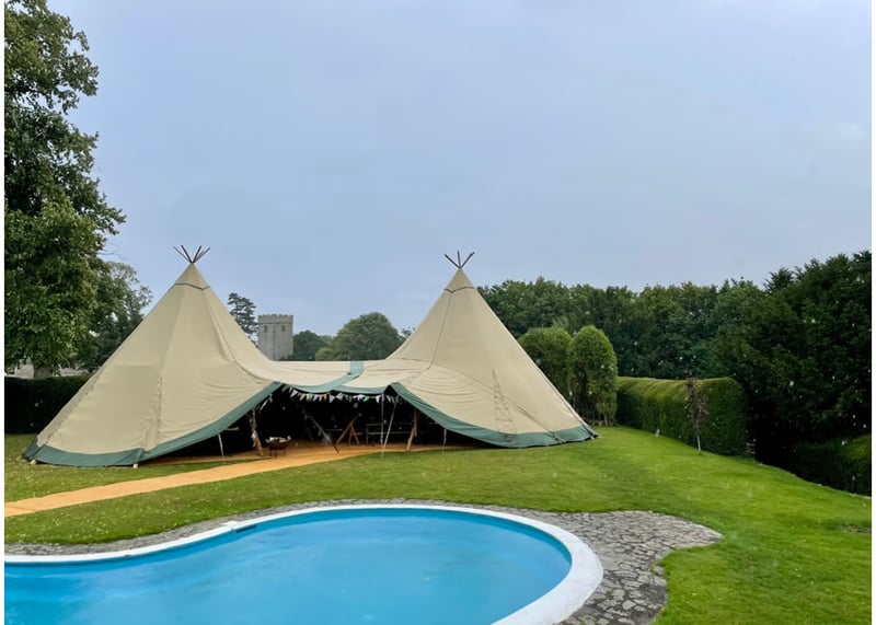 Peterstone Court, a Grade II* Queen Anne manor wedding venue in the Brecon Beacons with outdoor heated swimming pool and views of Pen y Fan