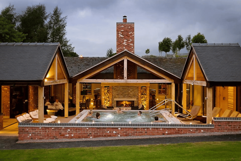 Lakeside ceremony gazebo and spa grounds at Moddershall Oaks, a country spa wedding venue in Staffordshire with outdoor heated pool