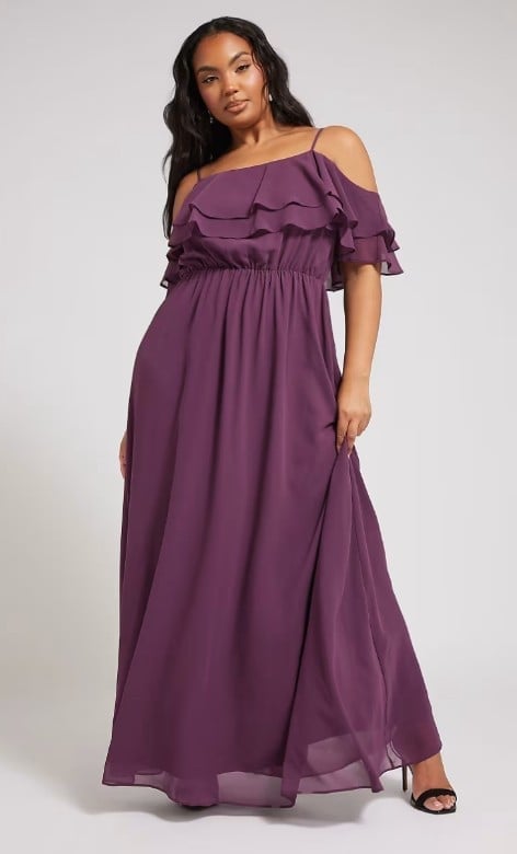 model showing off dark plum maxi dress