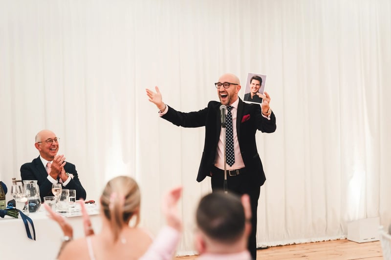 An MC at a wedding