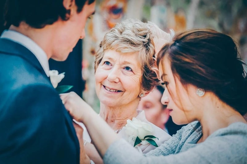 Mother of the groom looking at her son