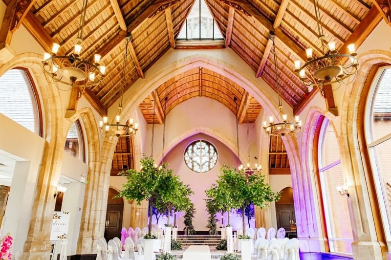 The interior of the wedding venue set up for a ceremony