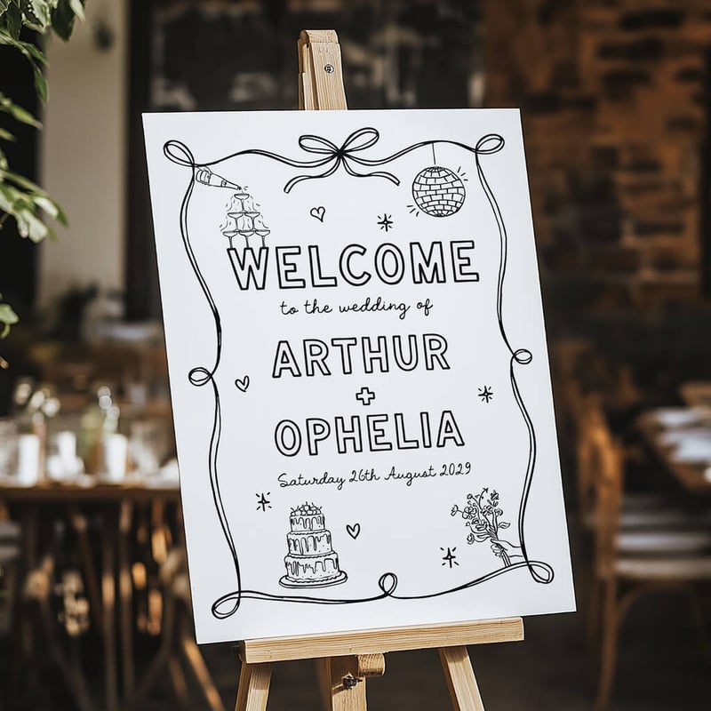 a black and white cartoon drawn of a wedding sign welcoming the guests to a wedding, propped up by a wooden easel