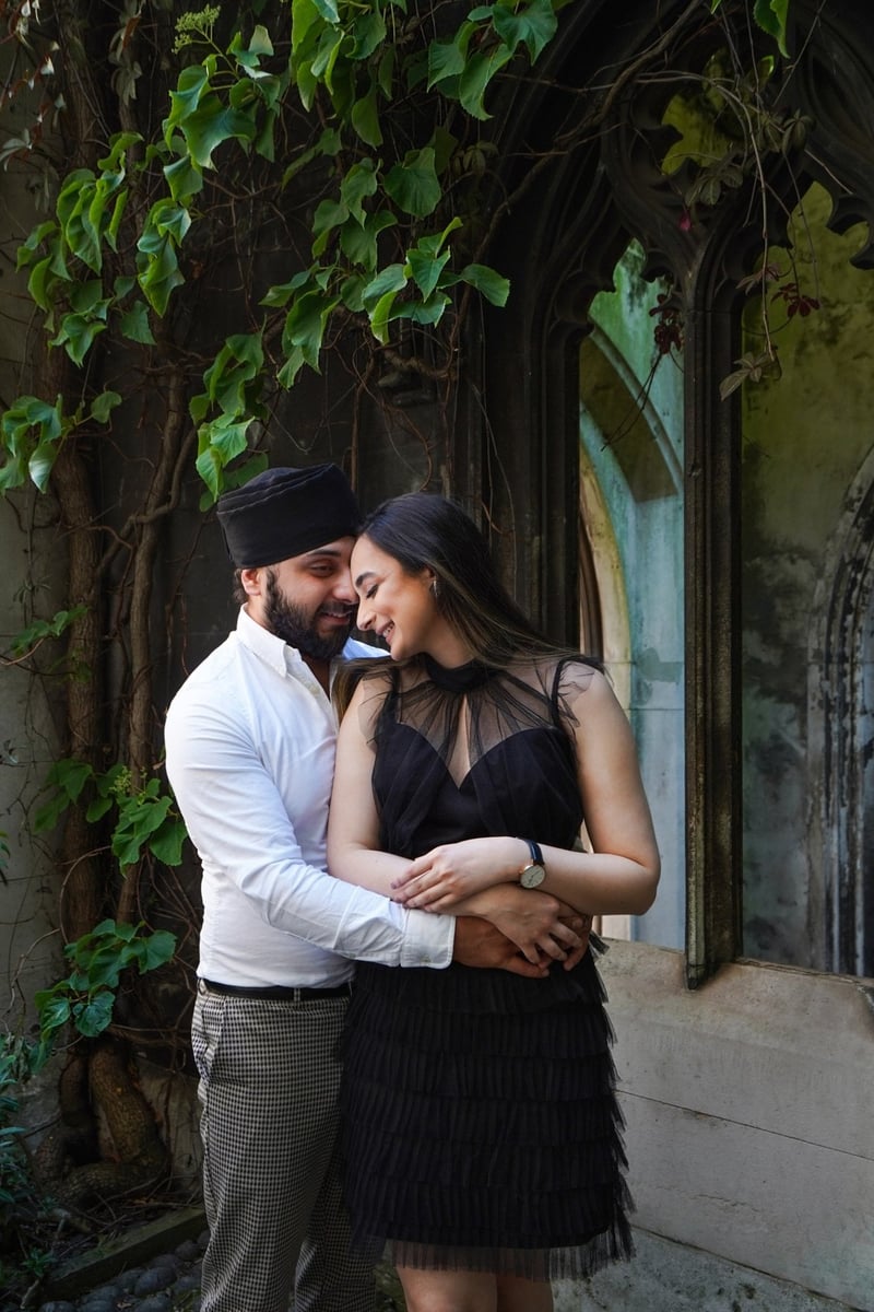a Hindu couple wearing black and white embracing on their pre-wedding photoshoot.