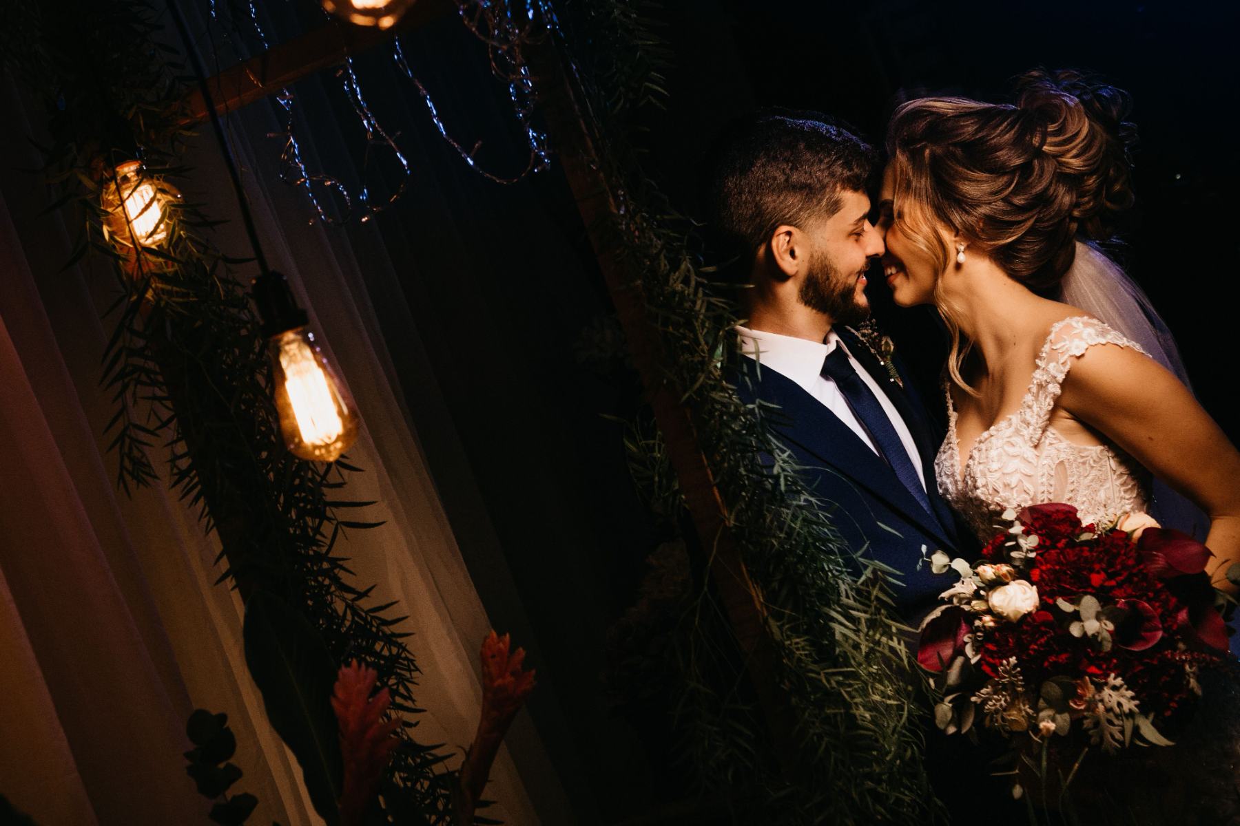 Bride and groom kissing at a wedding