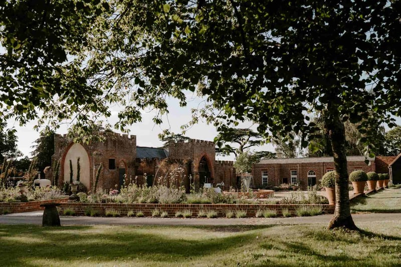 Exterior shot of barn wedding venue Wasing Park