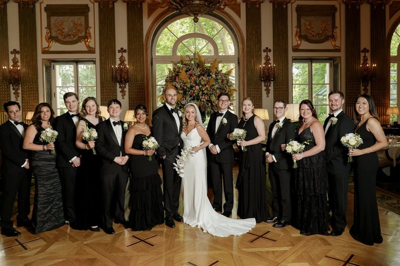 formal group shot from a black tie wedding in a grand country house.