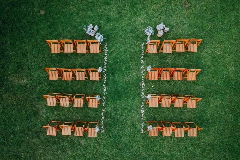 An aerial view of the wedding seating at an outdoor ceremony
