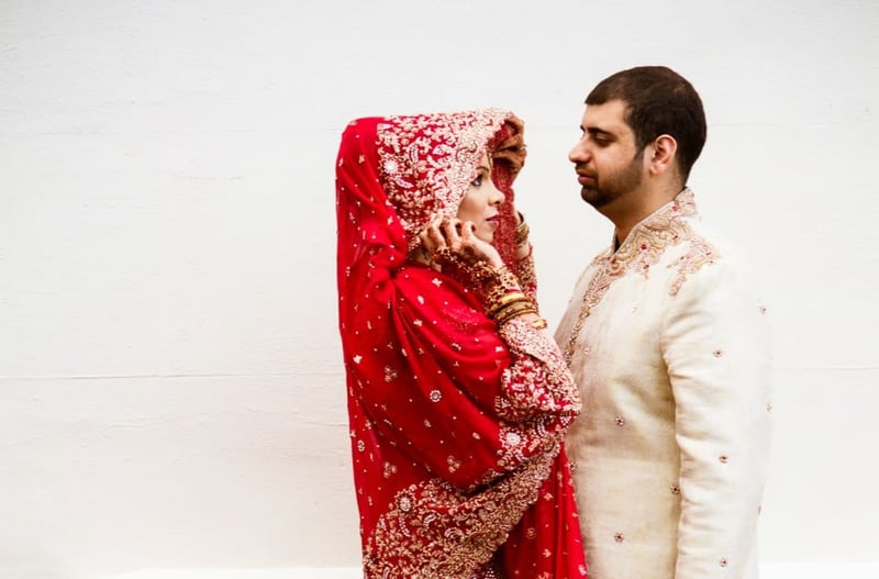 couple staring at each other lovingly at wedding