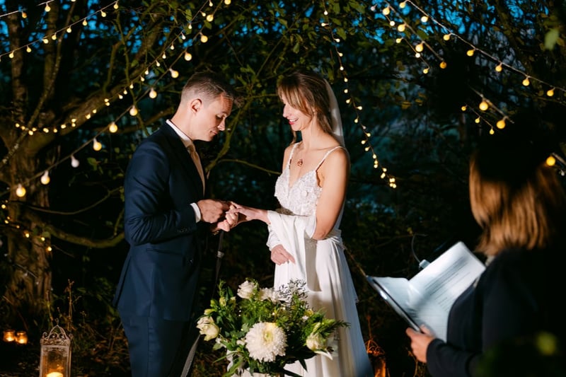 Couple exchanging rings at a destination wedding