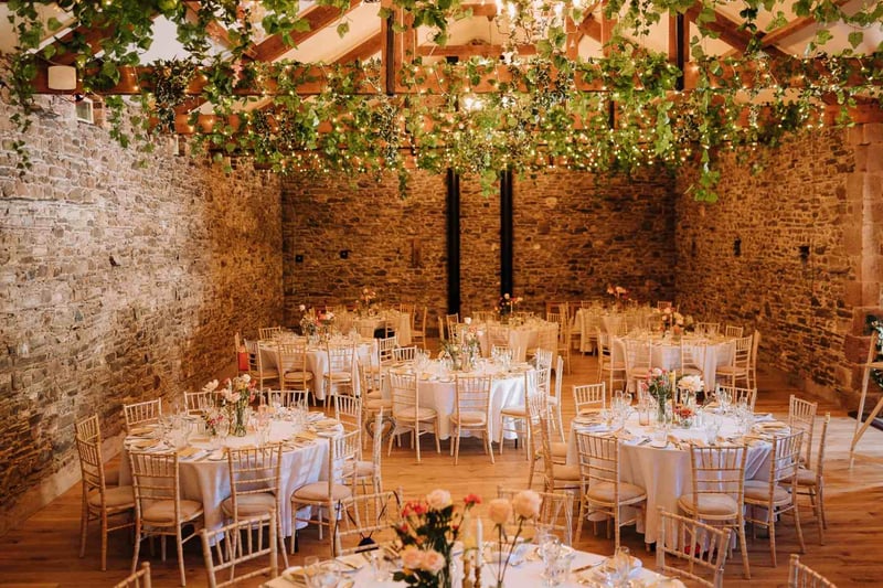 rustic interior of stone barn wedding venue