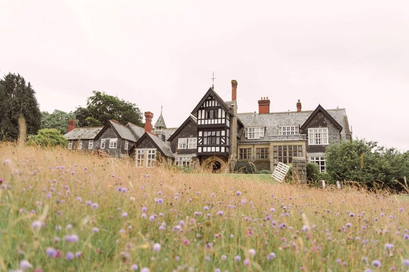 Welsh country house wedding venue with a wildflower meadow