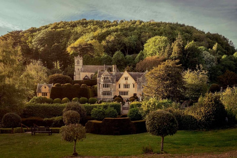 Exterior of owlpen manor surrounded by trees