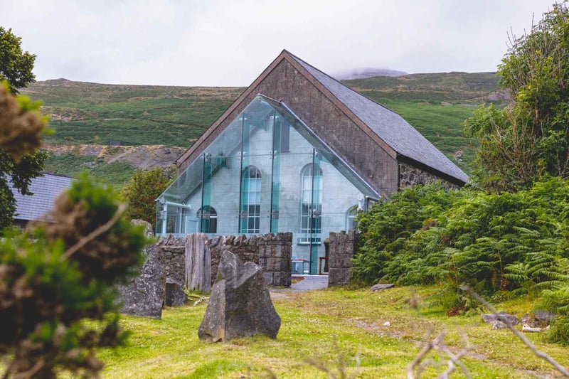 Rustic beach wedding venue in Wales with a modern glass exterior