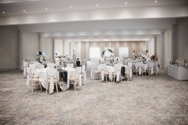 The Stones Hotel exclusive-use wedding venue, function suite set for a wedding breakfast, Wiltshire