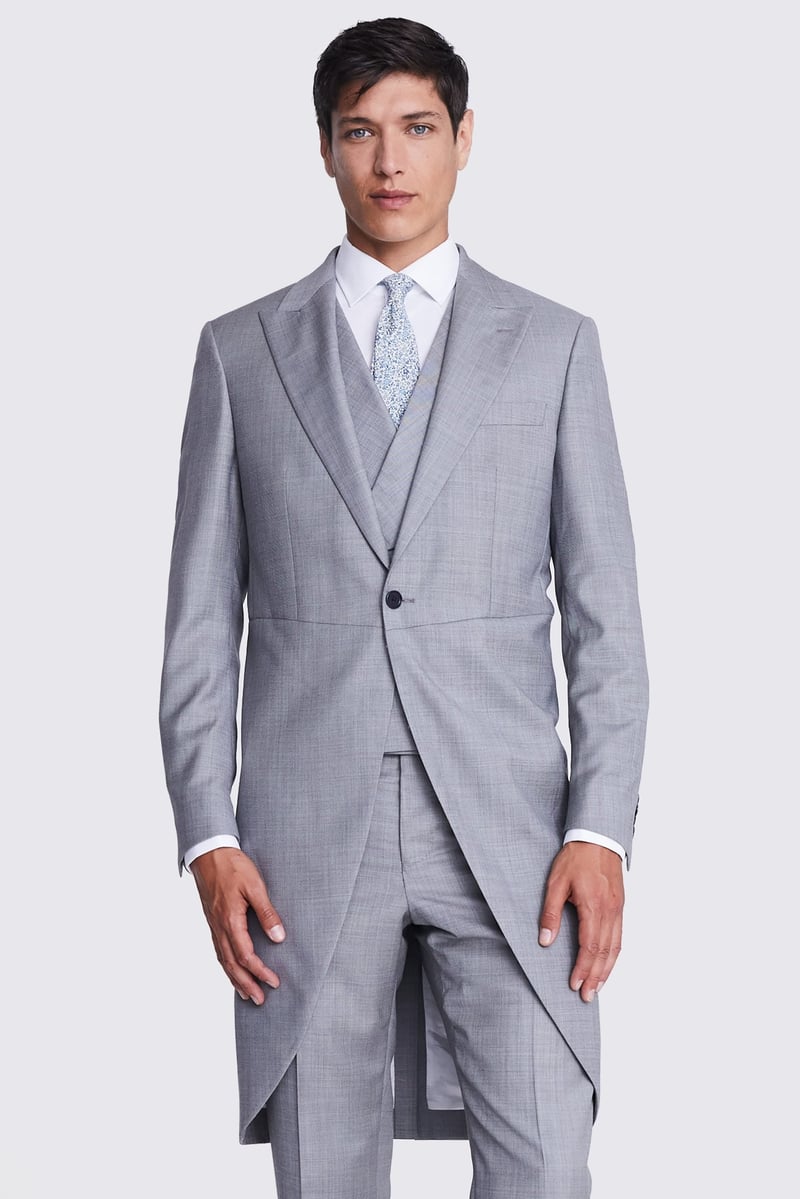 a male model wears a light grey morning suit with a tailored fit.