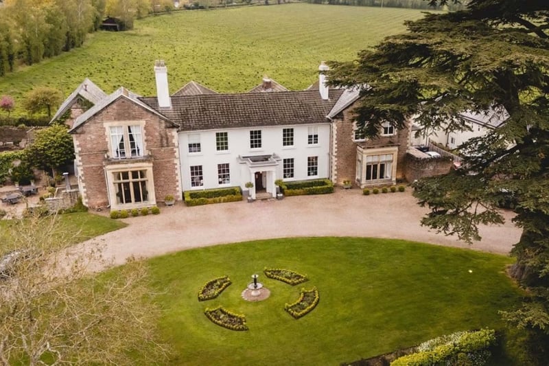 Glewstone Court Country House exclusive-use wedding venue, aerial view with circular lawn and gardens, Herefordshire