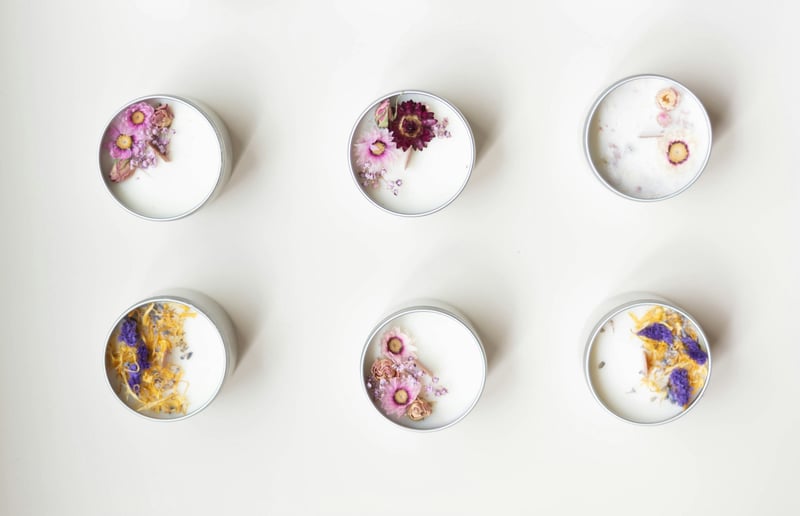 six homemade tealight wedding favours with petals.