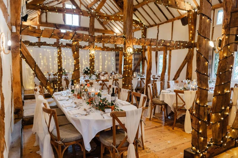 Rustic timber framed interior of pub wedding venue the plough