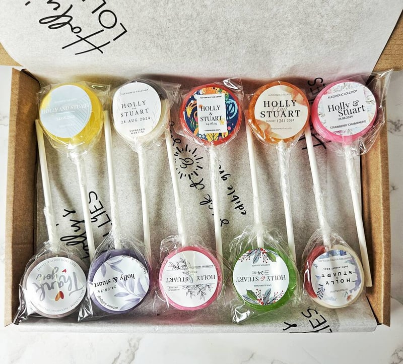 a box filled with 10 different flavoured and coloured lollipops
