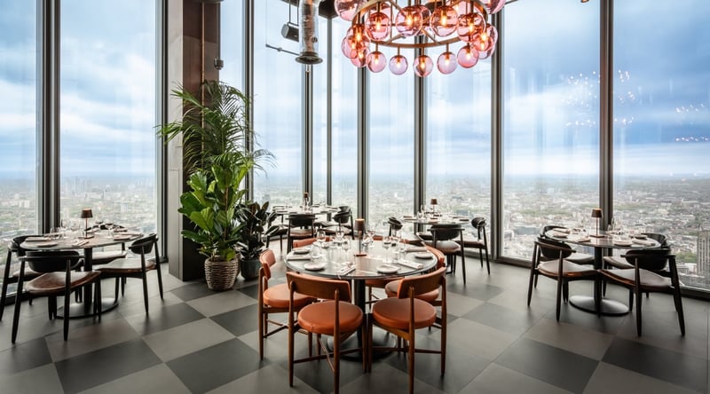a view of London skyline from a restaurant.