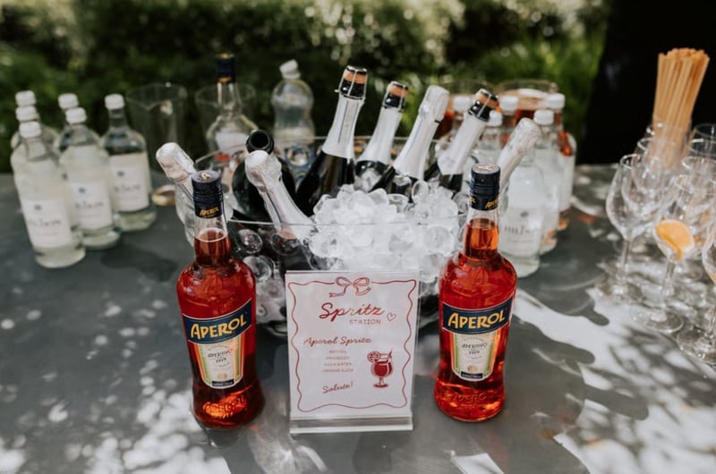aperol spritz table set up at a wedding
