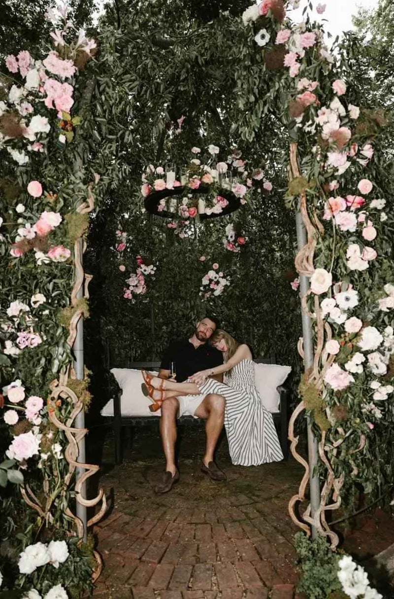 Taylor swift and travis kelce in the rose garden after their engagement