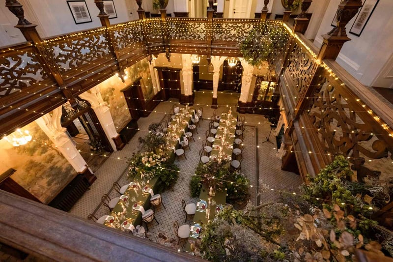 birds eye view of a wedding reception set up in a courtyard
