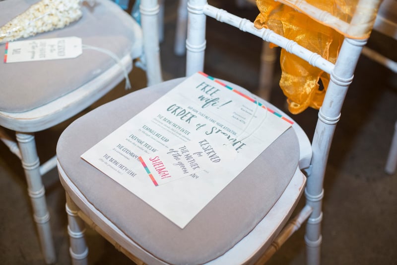 a modern order of service placed on a seat.