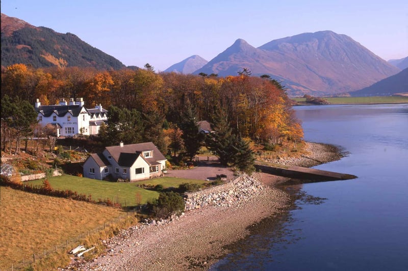 An autumnal wedding venue on the shore of a loch in Scotland