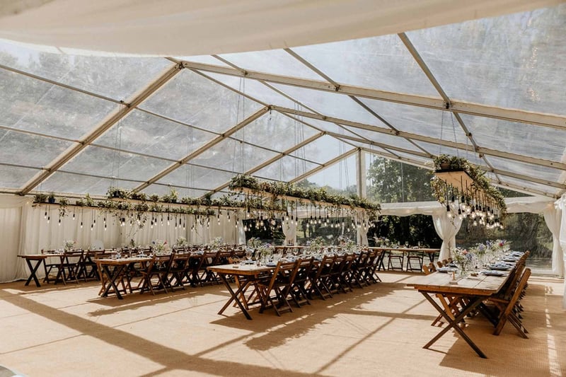 A glass marquee set up for a wedding in Cornwall