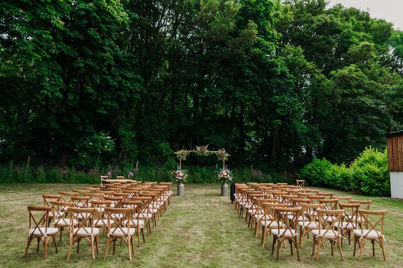 an outdoor wedding ceremony set-up.