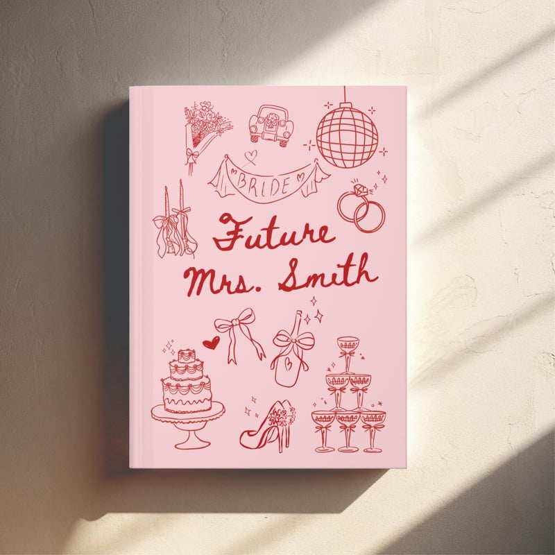 a pink and red personalised wedding planner.