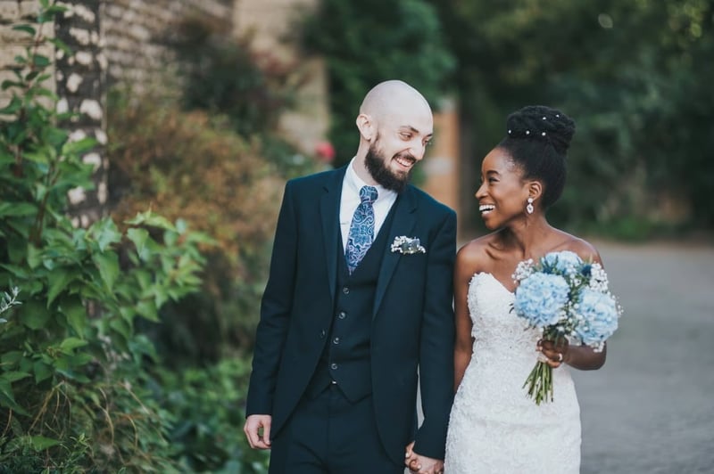 newly wedded bride and groom gazing at each other