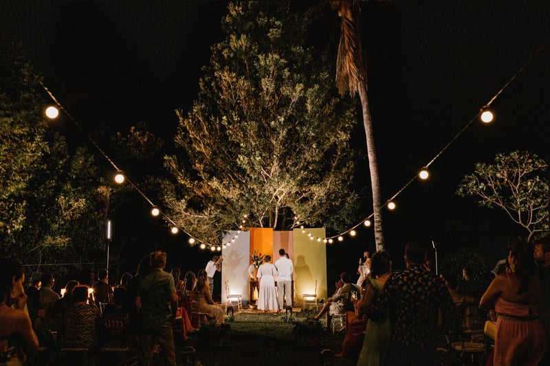 couple standing at the front for their backyard wedding ceremony